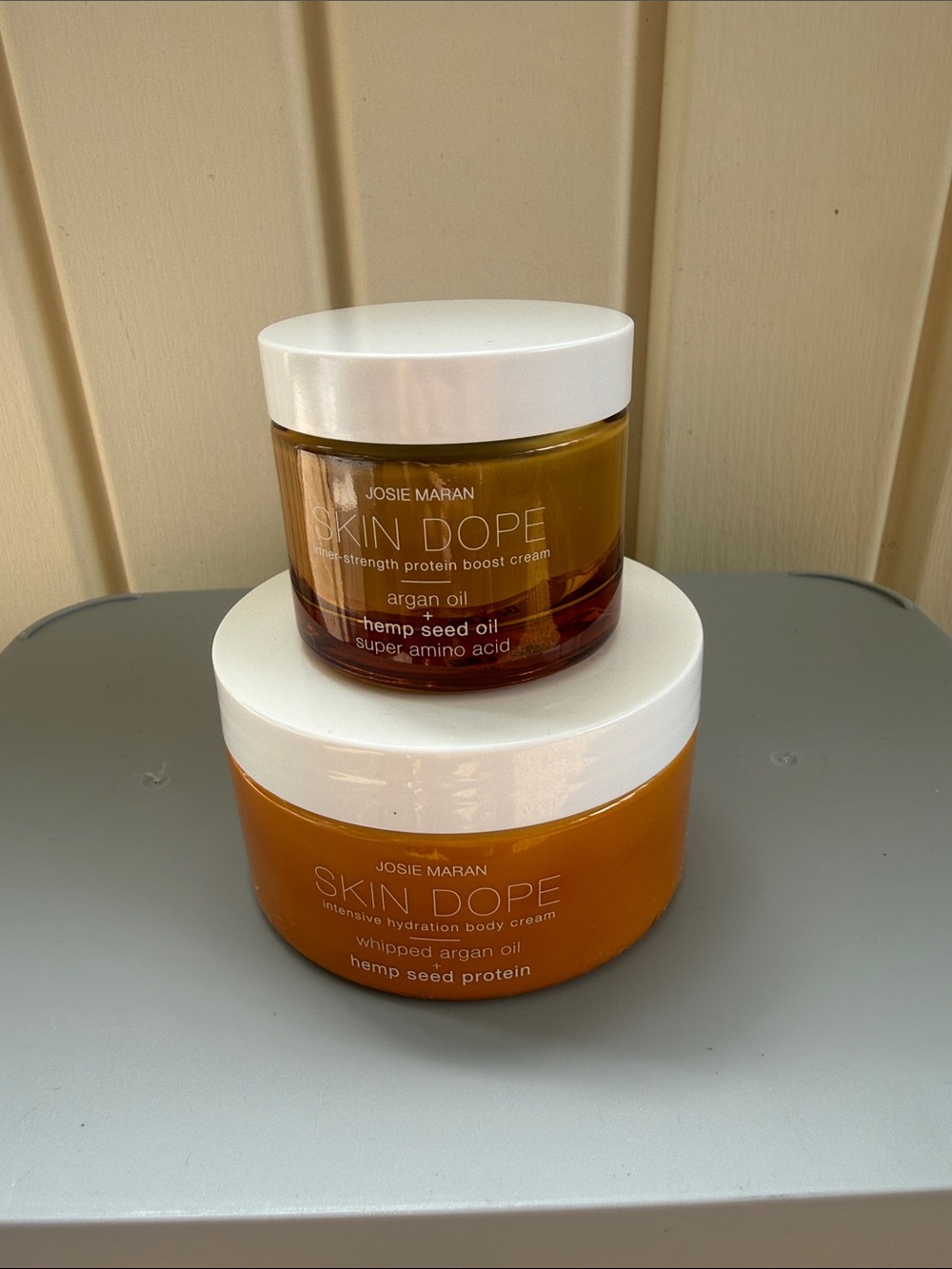 JOSIE MARAN Skin Dope Argan Oil Creams — Amber and White Jars
